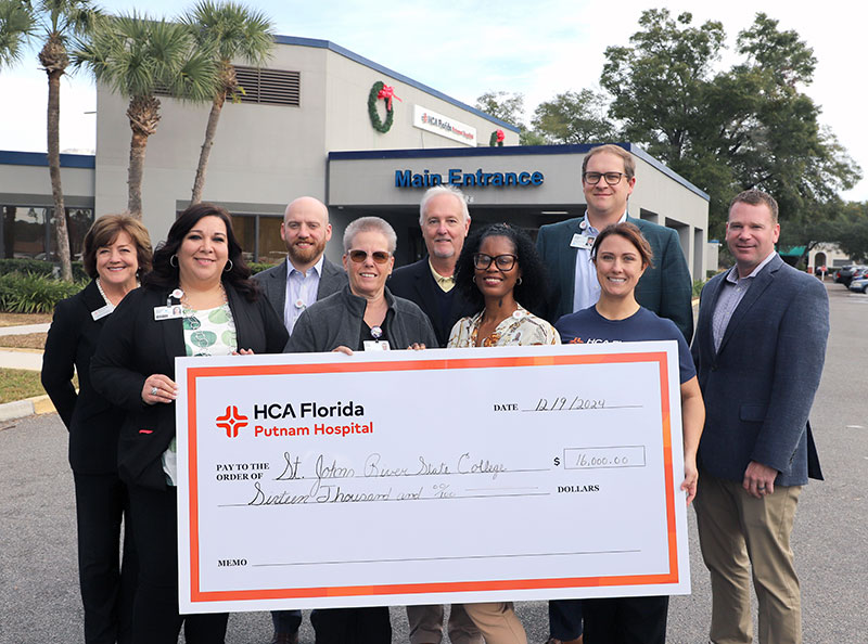 Group photo of HCA Florida Putnam Hospital, SJR State scholarship presentation.