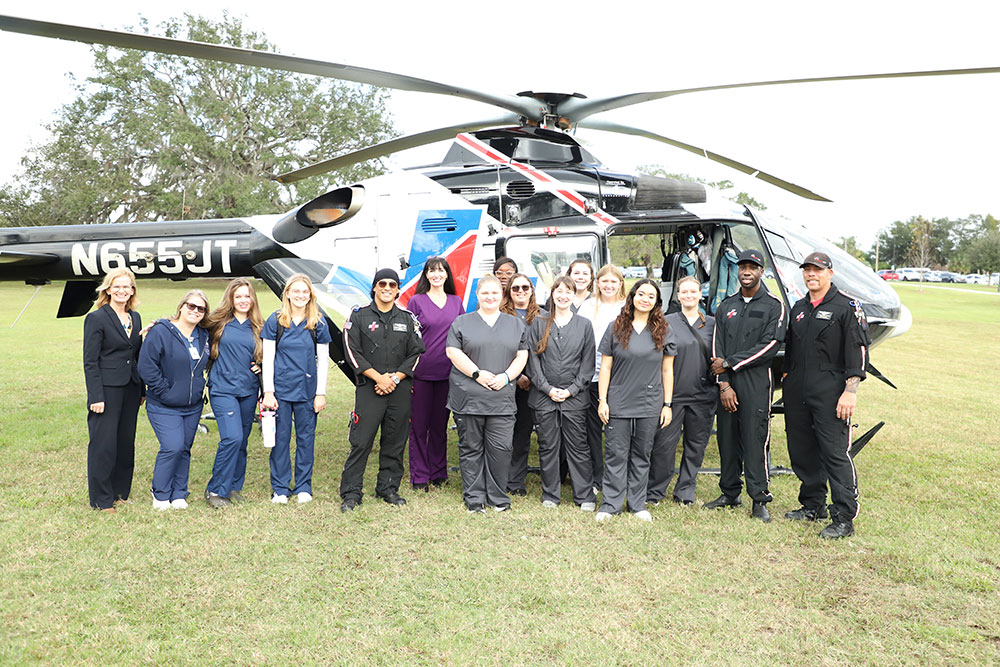 EMT/Paramedic and healthcare students with Trauma One helicopter